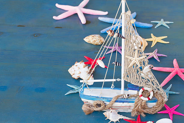 istock Seashells,  starfish and boat  with copy space 534787183