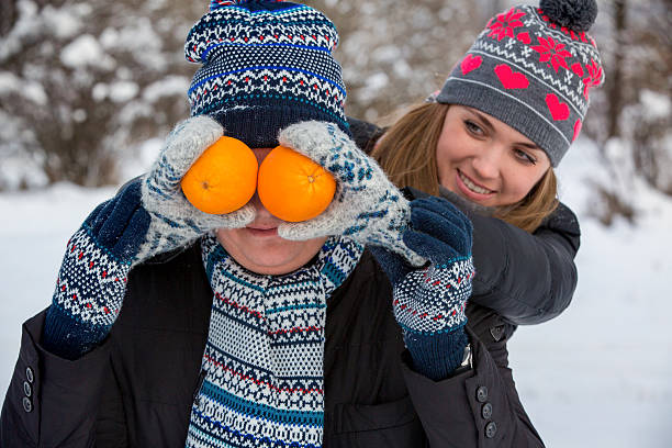 istock couple in love in a snowy park 534788703