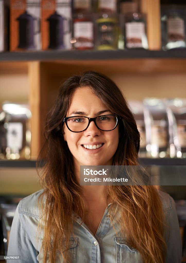 Selling only the best coffee Cropped portrait of a beautiful young woman in a store selling coffee 20-29 Years Stock Photo