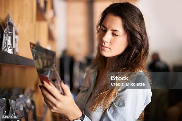 Making Sure Its Organic Stock Photo - Download Image Now - Label, Packaging, Looking