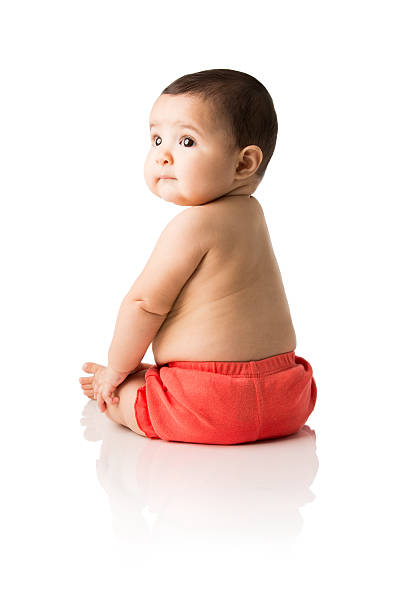 istock Baby girl sitting 534798579