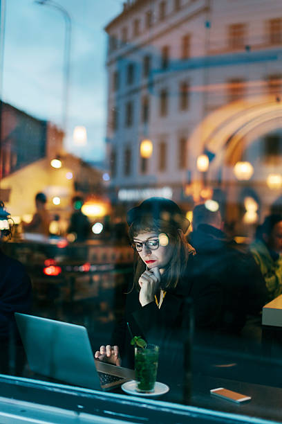 istock Woman using Free WiFi in Cafe 534801361