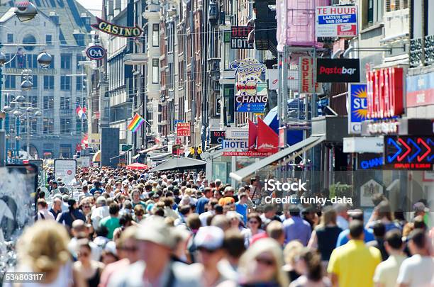 Damrak In Amsterdam Stock Photo - Download Image Now - City Street, Netherlands, Amsterdam