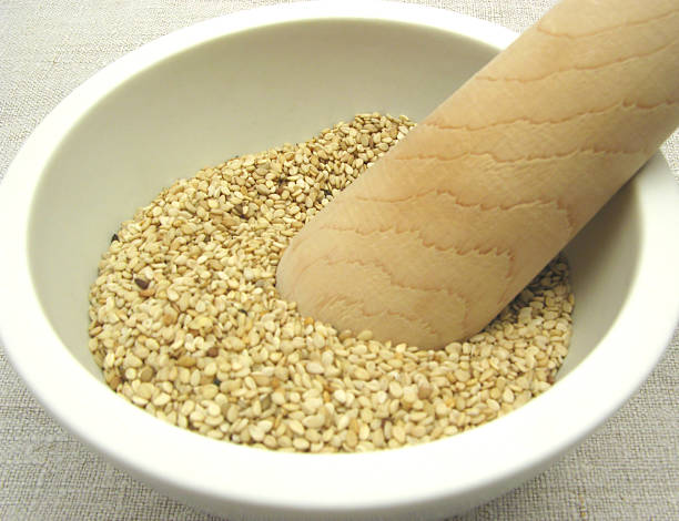 istock Sesame in a bowl of china ware with pestle 534803281