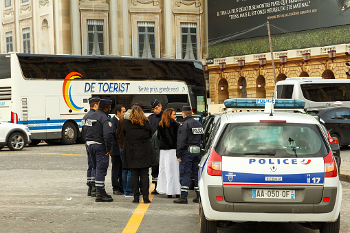  Paris, France - December 20, 2014: Police check on the Place de la Concorde wedding procession.