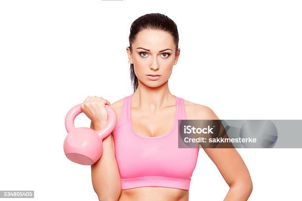 Young Sporty Woman With Kettlebell Stock Photo - Download Image Now - Kettlebell, Pink Color, 2015