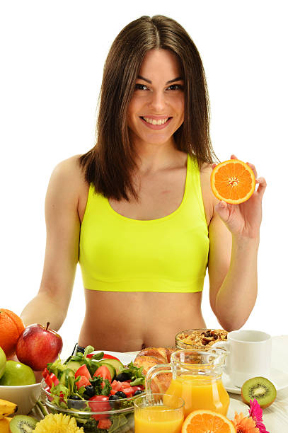 istock Young woman having breakfast. Balanced diet 534807031
