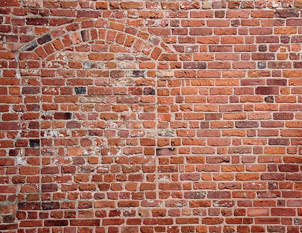 istock Blind secret hidden entrance in old red brickwall 534807211