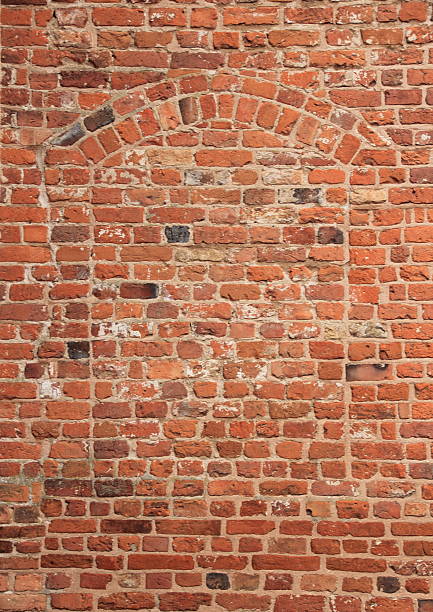 istock Vertical blind secret window in old red brickwall 534807213