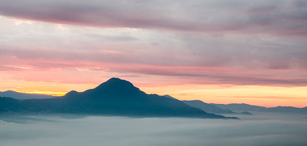 istock The first light of the day with mist 534807625