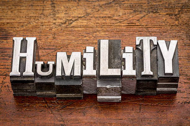 humility word in metal type stock photo