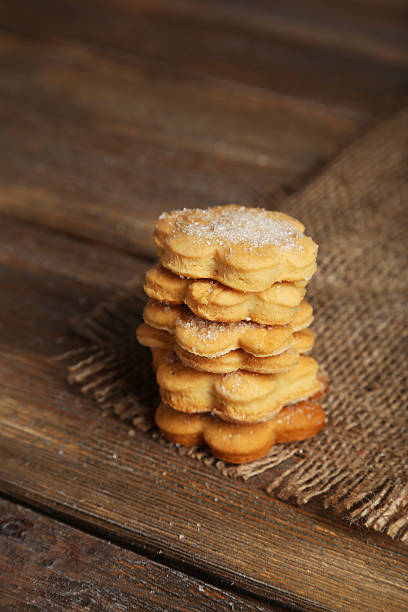 istock Cookies on brown wooden background 534824143