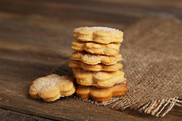 istock Cookies on brown wooden background 534824145
