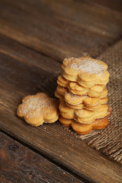istock Cookies on brown wooden background 534824149