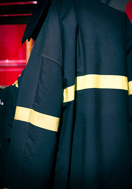 istock Firefighter's Coat Hanging ON A Fire Truck 534824185