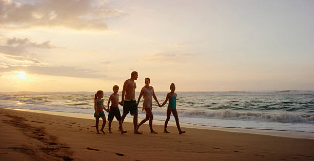 istock Family on vacation spending time at the beach 534824281