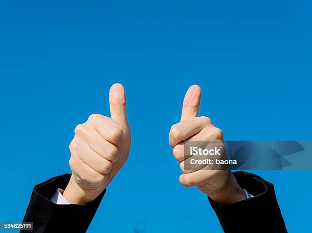 Businesswoman Thumbs Up Stock Photo - Download Image Now - 2015, Achievement, Adult