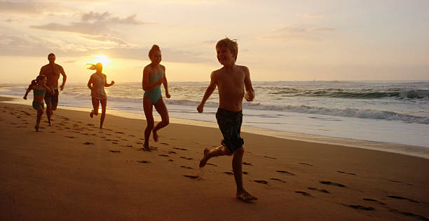 istock Family on vacation spending time at the beach 534825221