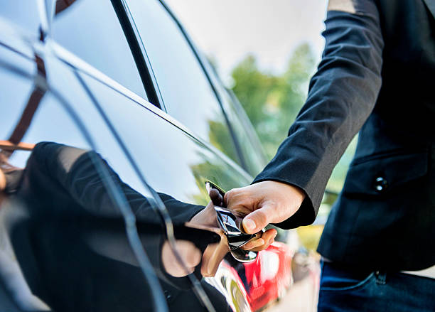 istock Chauffeur open car door 534825815