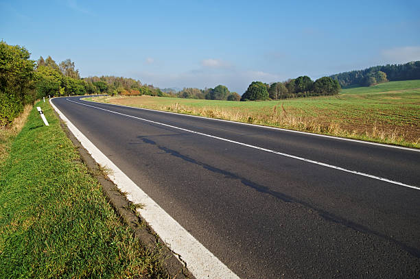 istock Empty asphalt road in countryside, bend of road 534826891