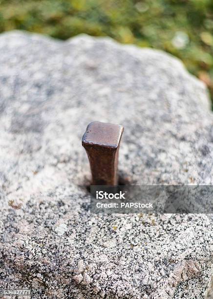 Iron Nail In The Stone Stock Photo - Download Image Now - 2015, Adversity, Built Structure