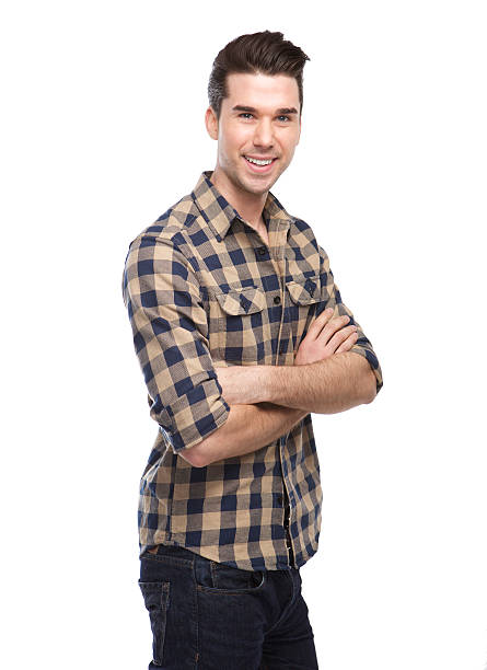 istock Attractive young man smiling with arms crossed 534828923