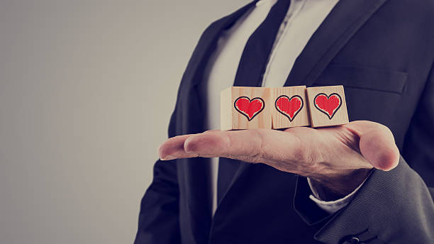 istock Wooden alphabet blocks with a hand-drawn red heart 534830543