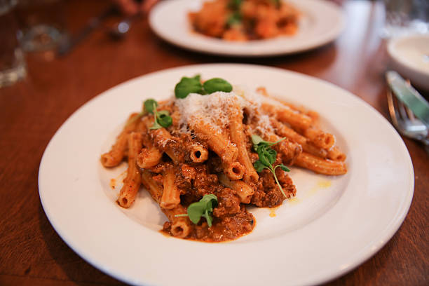 Rigatoni and Bolognese stock photo