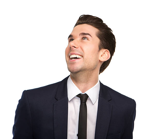 istock Young business man smiling and looking up 534832293