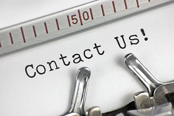 istock Typewriter detailed macro closeup typing text Contact Us!, large horizontal 534832631