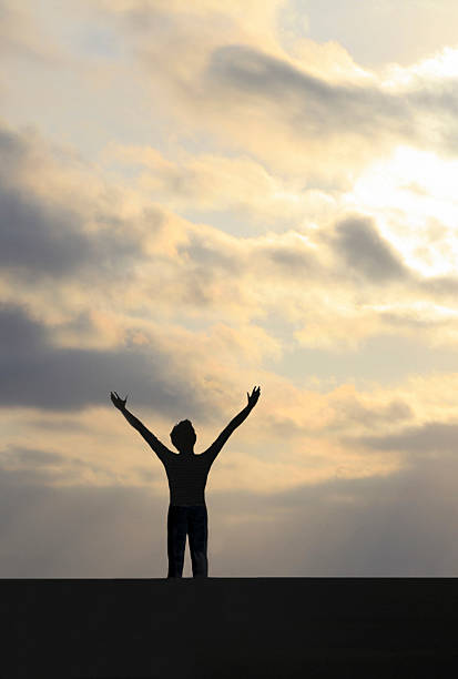 istock Woman with arms raised. 534833293
