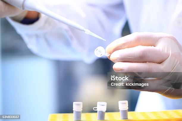 Scientist Hand Using A Pipette Stock Photo - Download Image Now - 2015, Adult, Adults Only