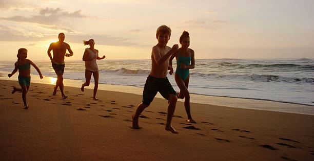 istock Family on vacation spending time at the beach 534844581
