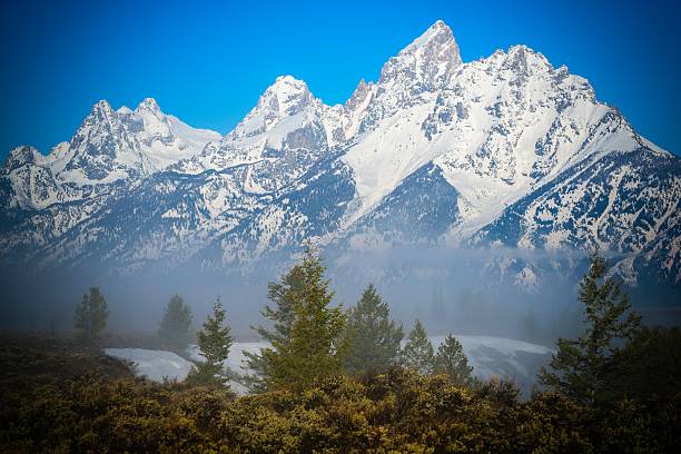 The iconic Grand Teton Mountains, as viewed from Jackson Lake. Taken inside Grand Teton National Park from Colter Bay, Wyoming
