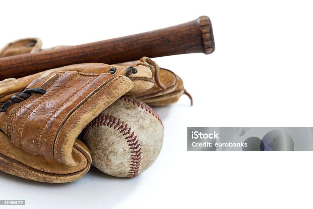 Vintage Baseball Equipment Vintage baseball, bat and glove isolated on a white background Baseball Bat Stock Photo