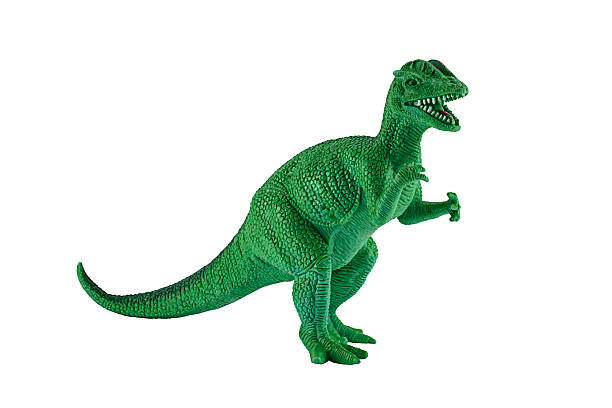 istock Dilophosaurus dinosaur toy figure isolated on white. 534845819