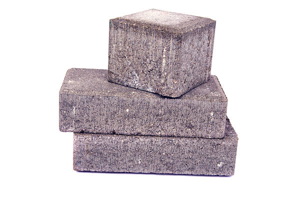 new gray decorative street pavement concrete bricks paving stone isolated on white background