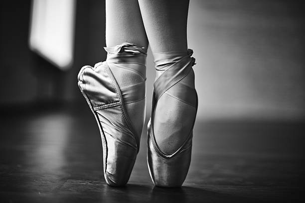Elegant dance Feet of dancing ballerina during rehearsal ballet dancer feet stock pictures, royalty-free photos & images