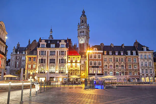 Old buildings on the Grand Place square at the evening, Lille, France