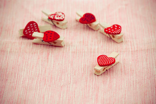 istock Wooden clothespin heart shaped. 534861673