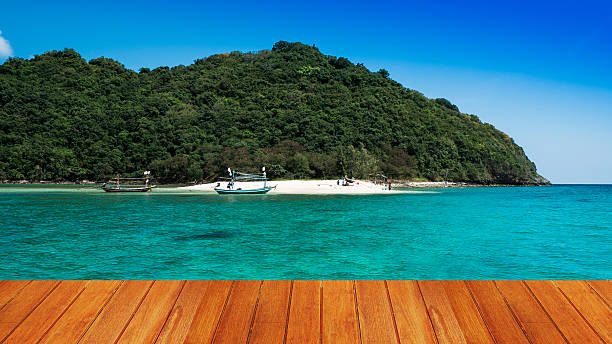 istock wood texture and sea view blue sky 534862331