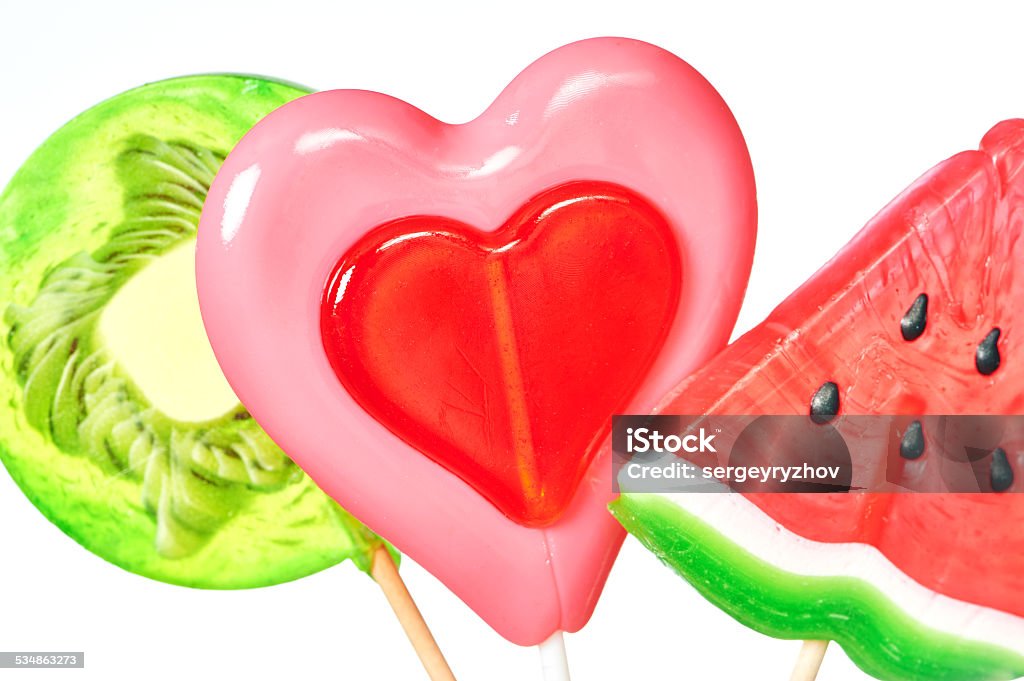 Lollipop heart, watermelon and kiwi Lollipop in the form of heart, watermelon and kiwi 2015 Stock Photo