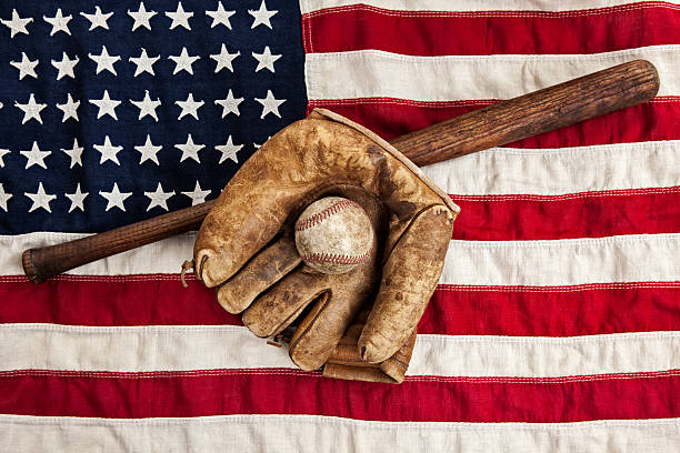 istock Vintage Baseball Equipment on American Flag 534864655