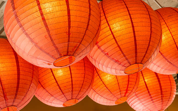 istock Group of paper lanterns hanging from the roof 534864661