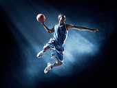 istock Basketball player in jump shot 534864947