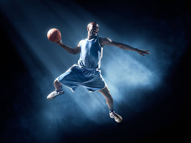istock Basketball player in jump shot 534864949