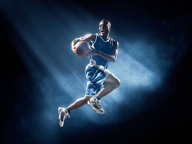 istock Basketball player in jump shot 534864951