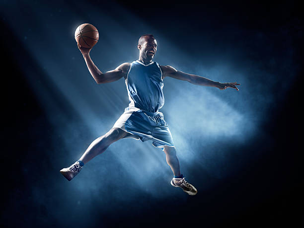 istock Basketball player in jump shot 534864953