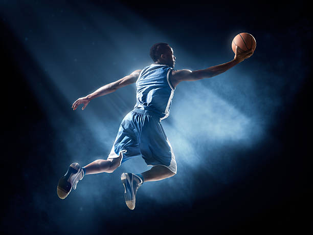 istock Basketball player in jump shot 534864957