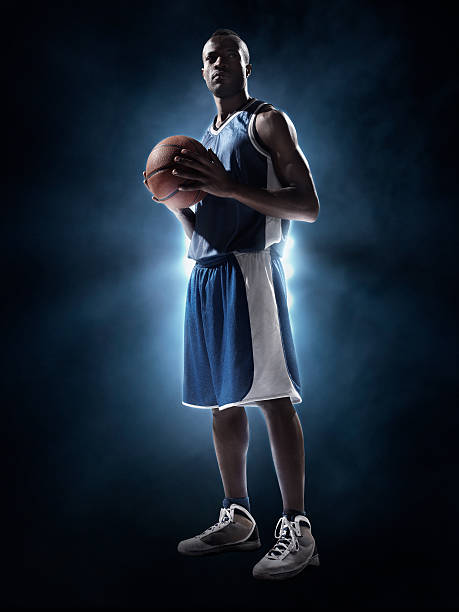 basketball player - sportsman front view studio shot looking at camera stock-fotos und bilder